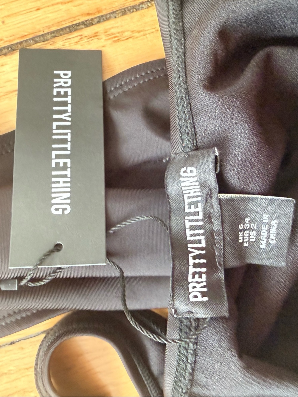 PrettyLittleThing Black One-Piece with belt detail - Picture 6 of 6
